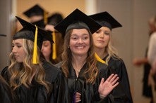Students walking into recognition ceremony