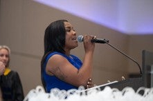 Photo of Kym Jefferson singing